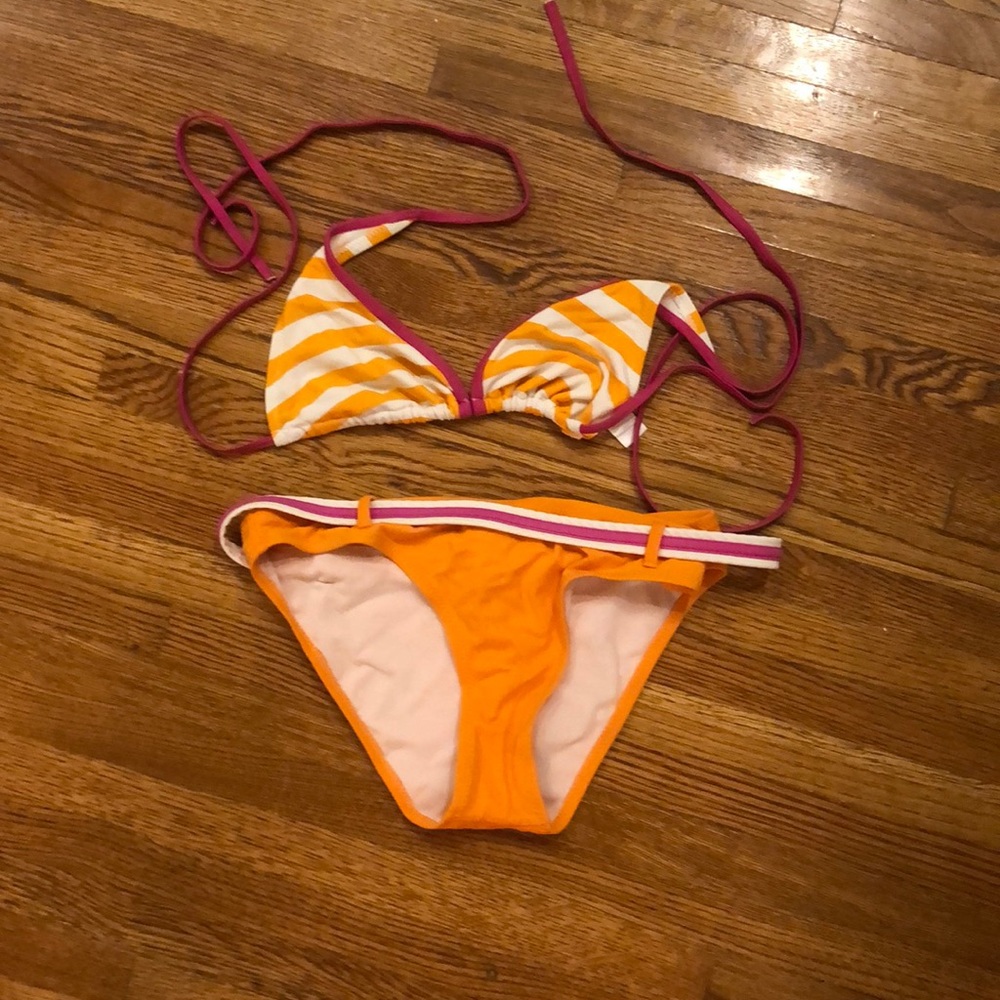 A orange and white striped bikini
